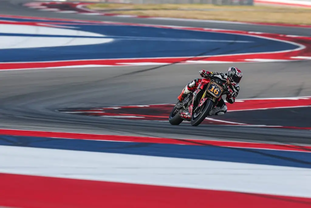 VIP Superfans in the MotoAmerica paddock at COTA cheering for AJ Peaslee Racing