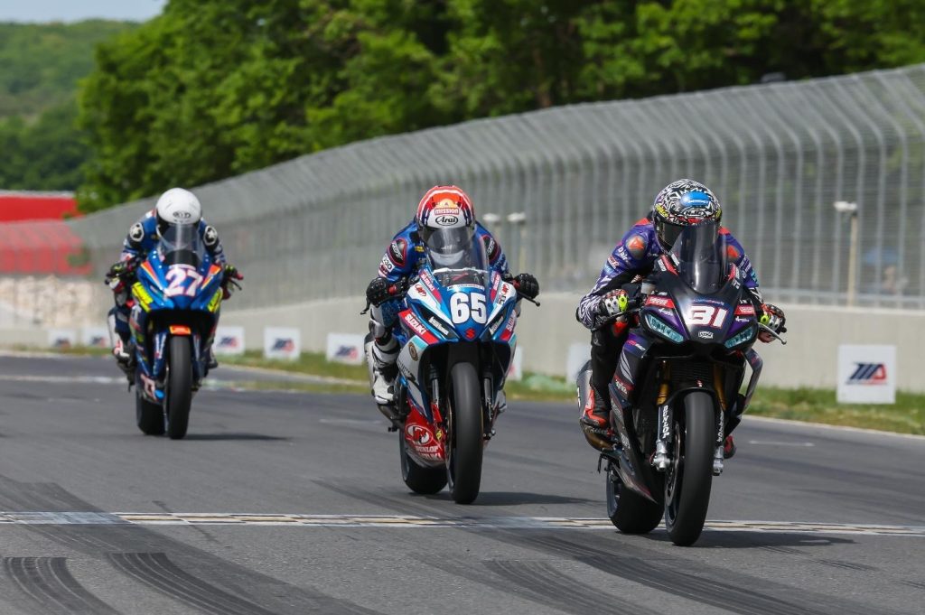 MotoAmerica King of the Baggers podium celebration at Mid-Ohio, riders and crew with trophies
